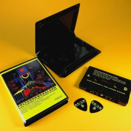 Black cassettes with yellow UV LED printing, supplied in rave cases with printed inserts and matching black guitar picks with yellow UV LED printing