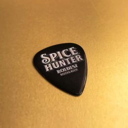 Black guitar picks with full colour printing, produced for Spice Hunter rum