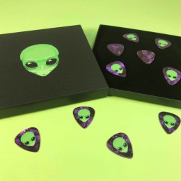 Pearl purple guitar picks and black CD matchboxes with full colour on-body UV-LED printing