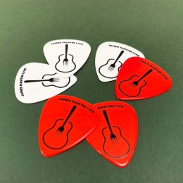 Red and white printed Guitar picks
