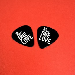 Black guitar picks with white on-body print,  created in conjunction with the release of the Bob Marley: One Love film